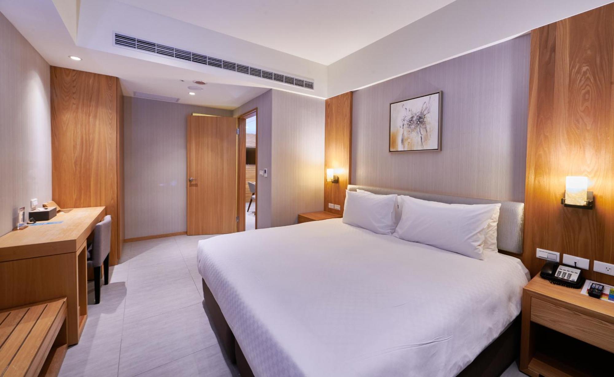 그랜드 베이 리조트 헝춘 외부 사진 A bedroom at the hotel